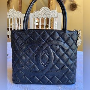 Chanel medallion handbag tote . Black with silver hardware . Almost pristine